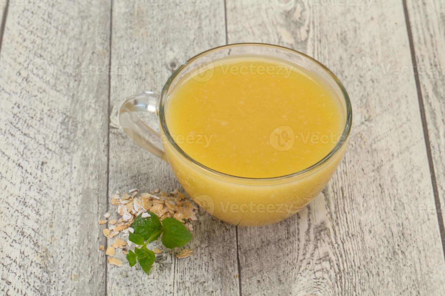 Dietary vegetarian oats milk over wooden photo