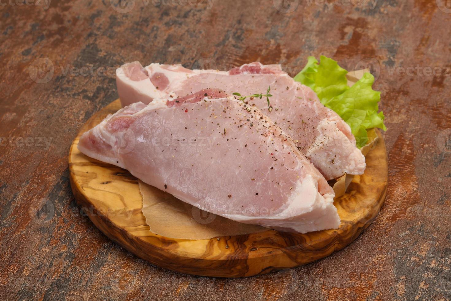 Raw pork meat steak for grill photo