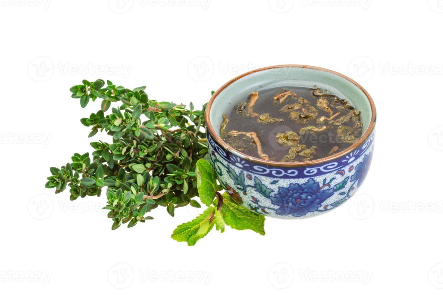 Tea with thyme and mint photo