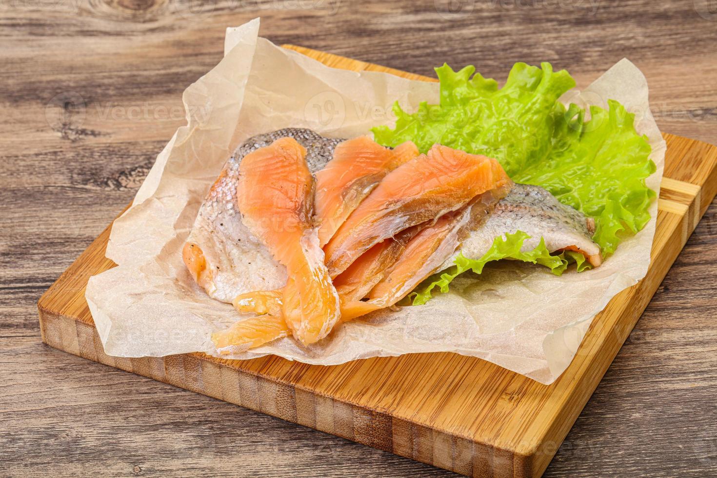 Sliced natural wild trout fillet 8914379 Stock Photo at Vecteezy