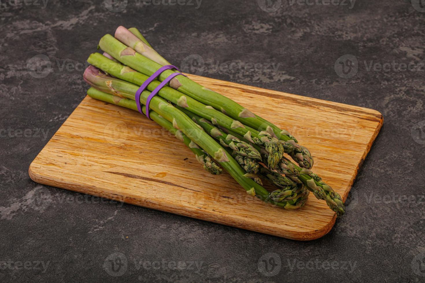 Vegan cuisine - Raw asparagus heap photo