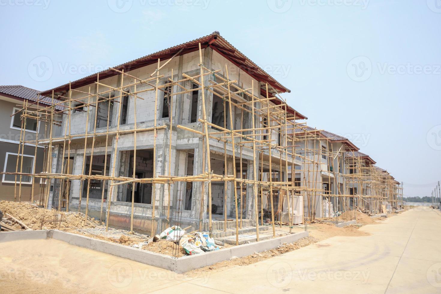 house under construction with autoclaved aerated concrete block structure at building site photo