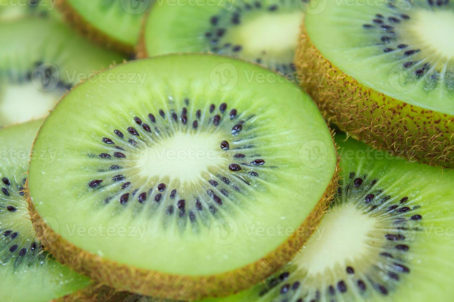 beautiful kiwi fruit slices background photo