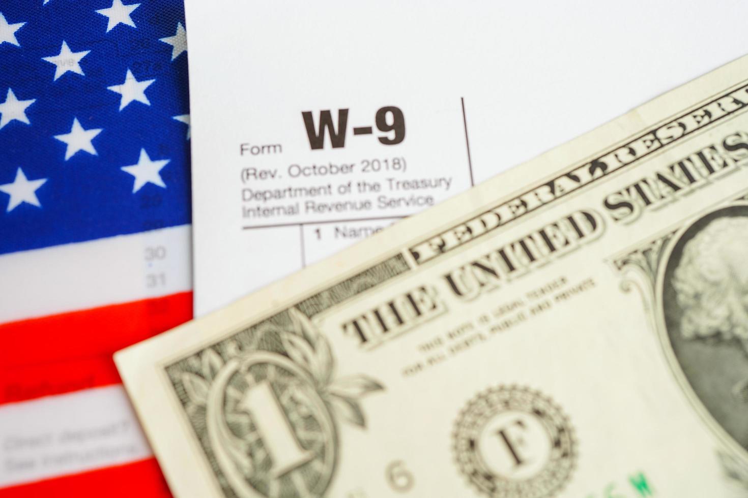Tax form W-9 Request for Taxpayer Identification Number and Certification, business finance concept. photo