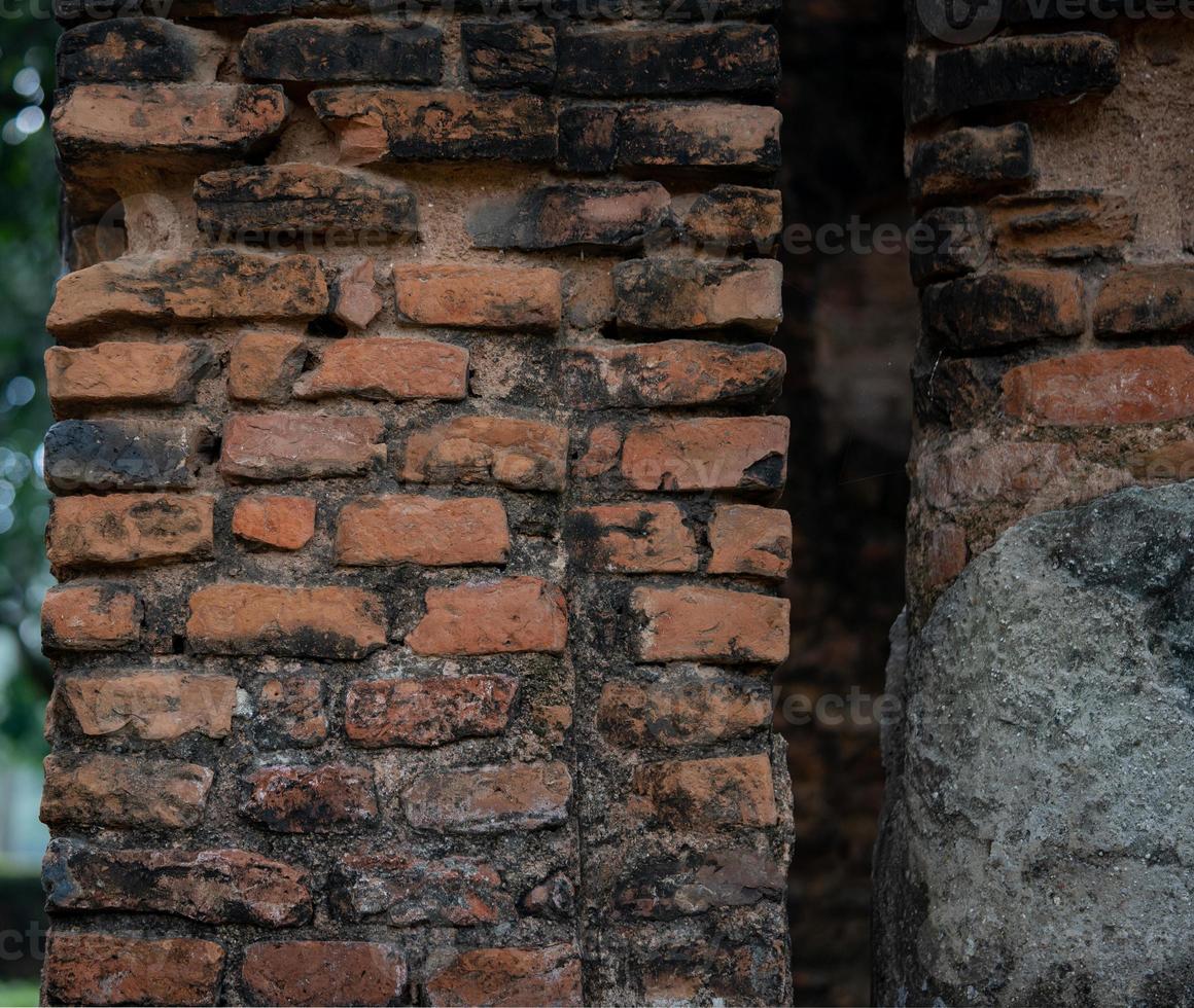 The texture of a red brick wall of an old king's palace photo