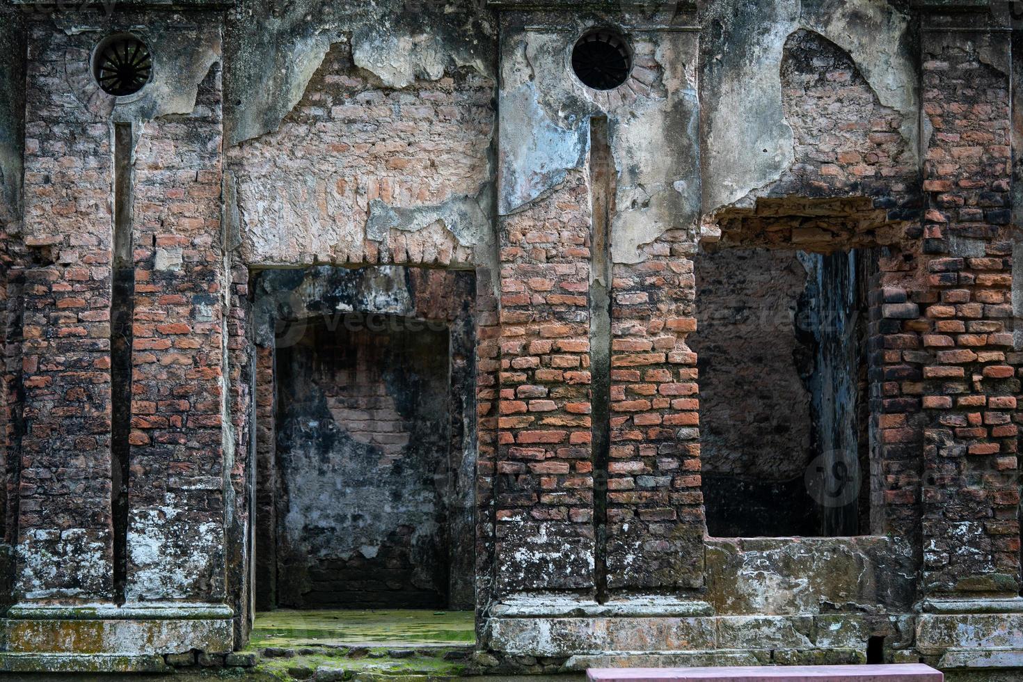 The texture of a red brick wall of an old king's palace photo