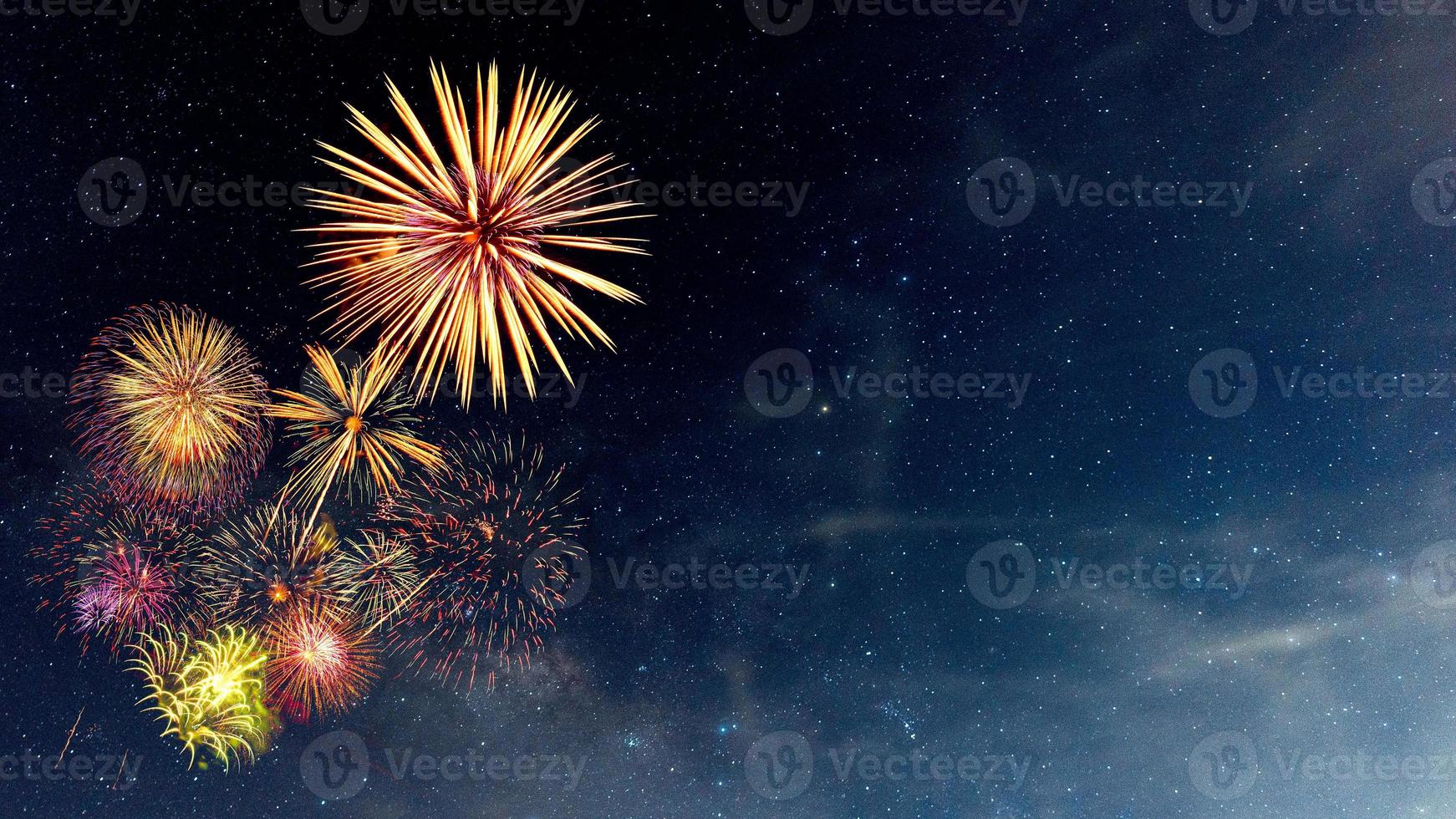 Fireworks with blur milky way background photo