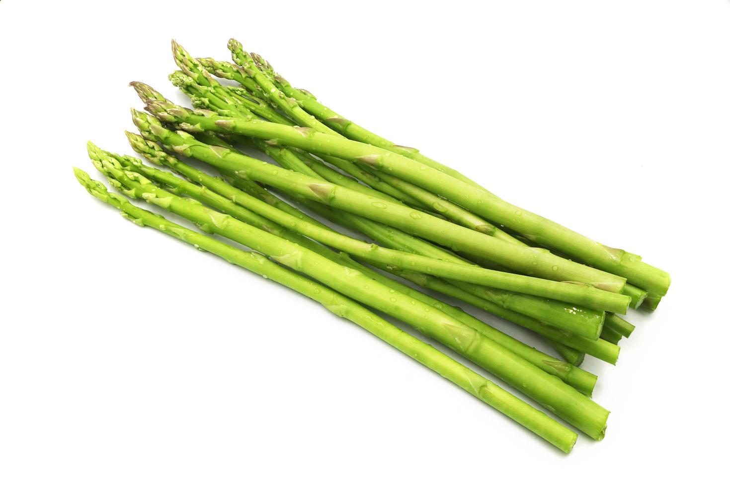 Fresh asparagus vegetable isolated on white background. photo