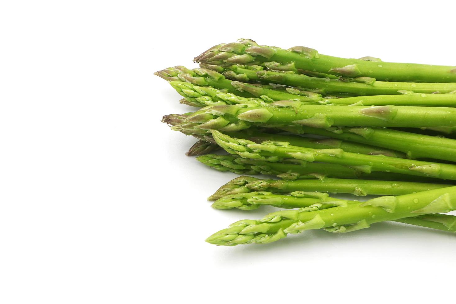 Fresh asparagus vegetable isolated on white background. photo