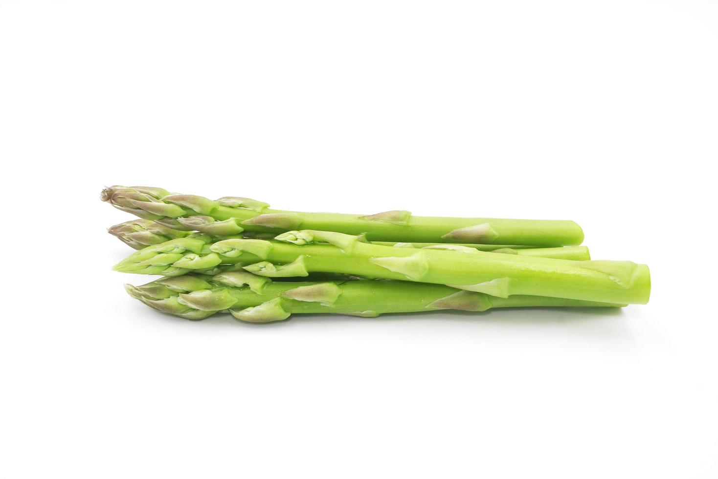 Fresh asparagus vegetable isolated on white background. photo