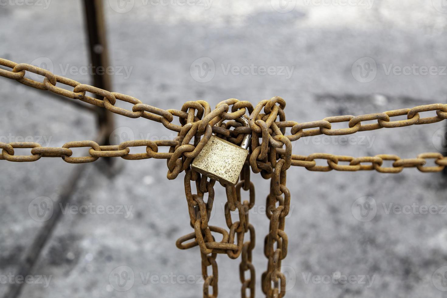 Rusty padlocks on a fence photo