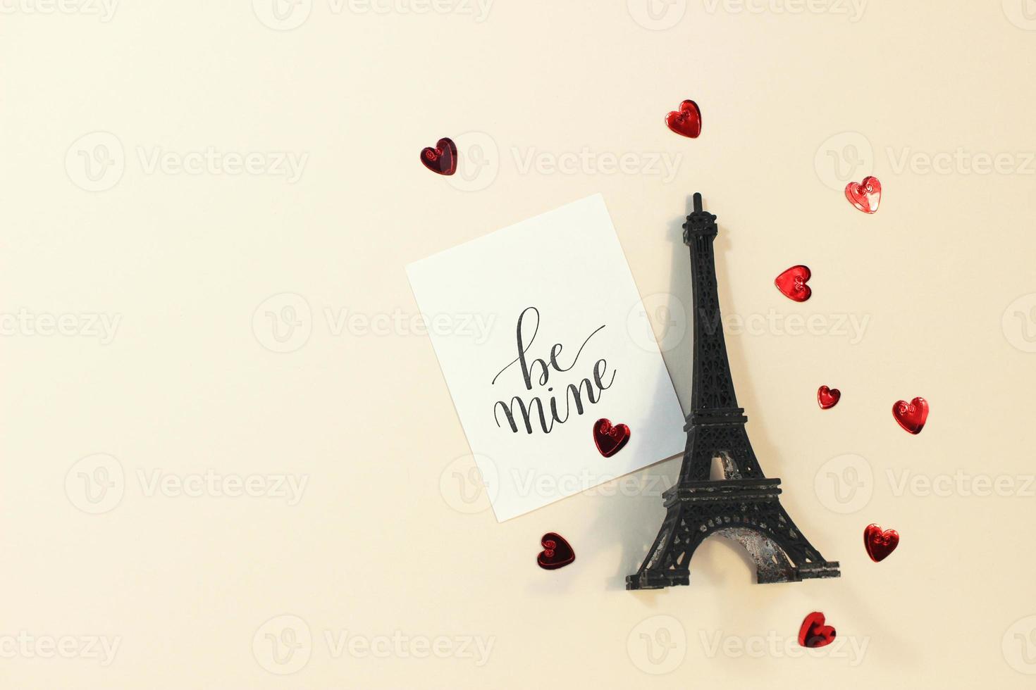 Valentine's Day background. Romantic love letter for Valentine's day concept. Eiffel tower. Flat lay, top view, copy space. photo