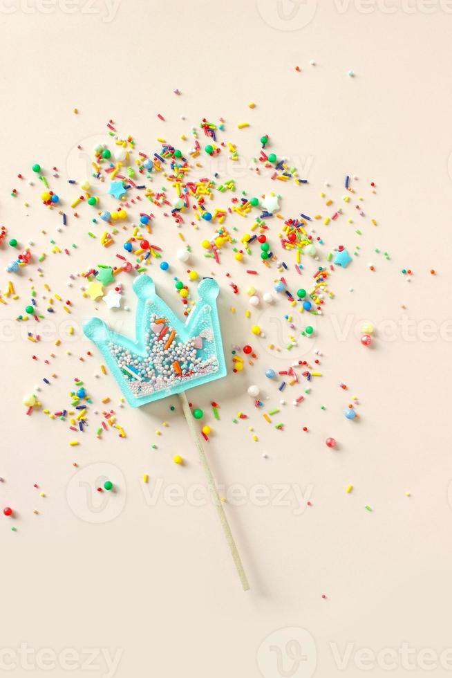 Birthday party background with lollipops. Copy space. photo