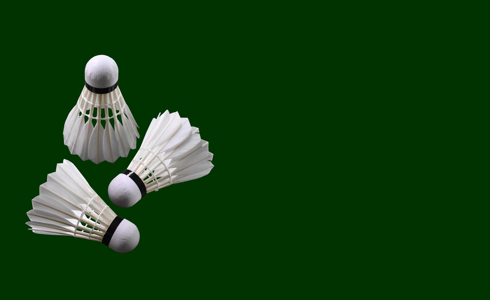 Isolated badminton feather shuttlecocks with clipping paths. photo