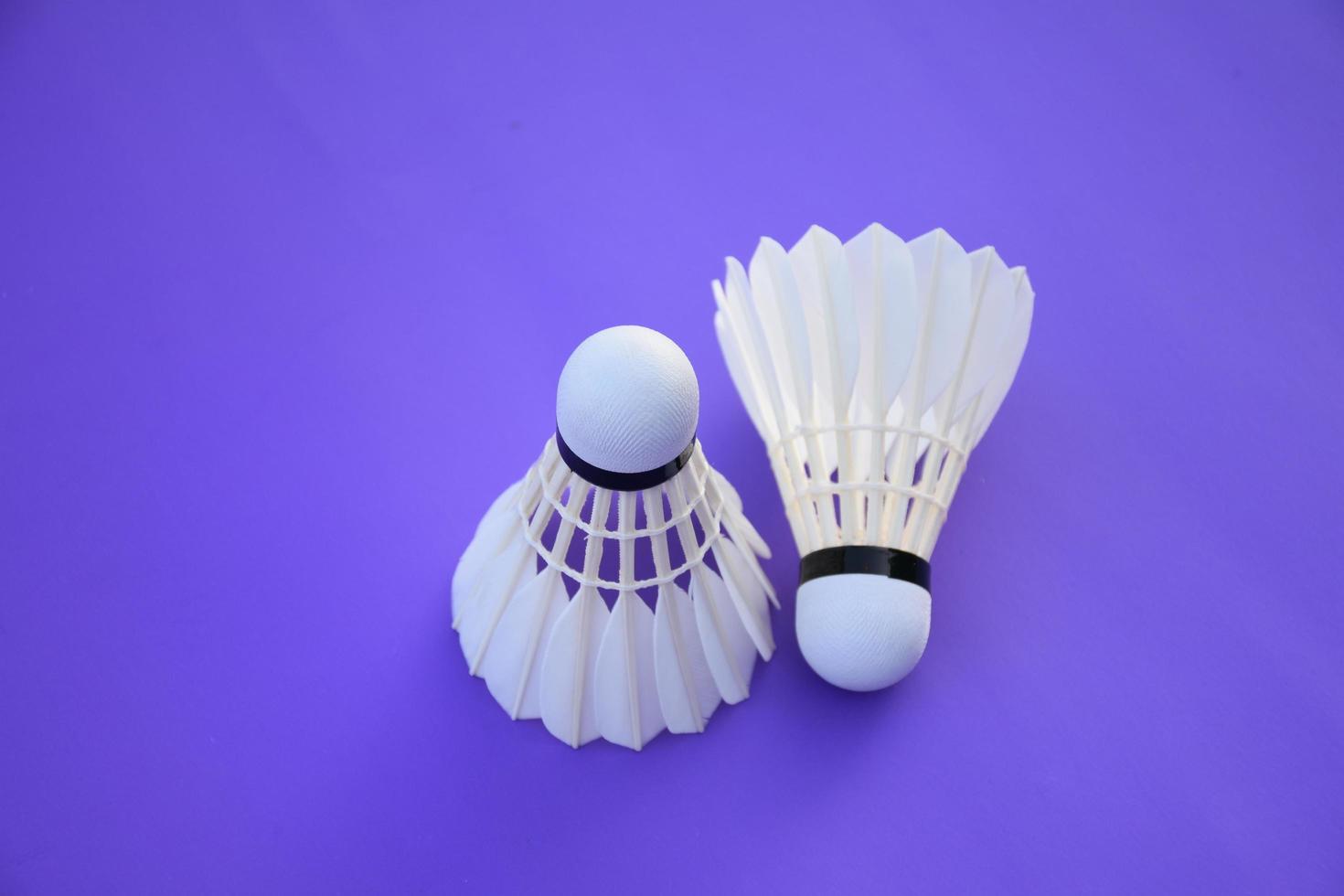 isolated white cream badminton shuttlecock feather, for badminton sport playing. photo