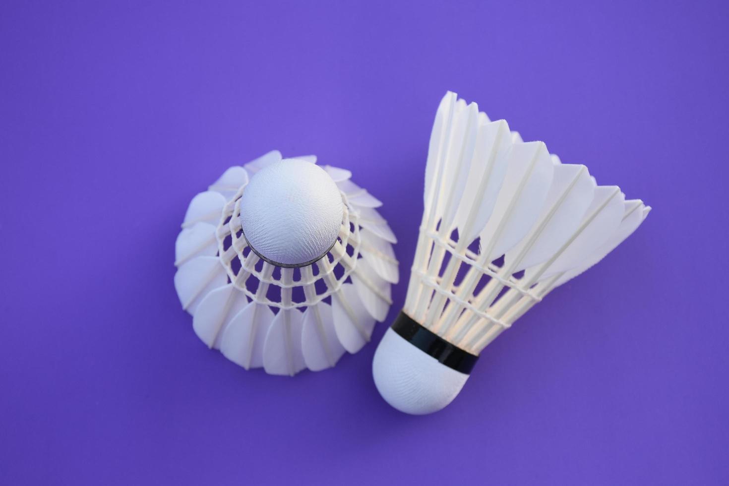 isolated white cream badminton shuttlecock feather, for badminton sport playing. photo