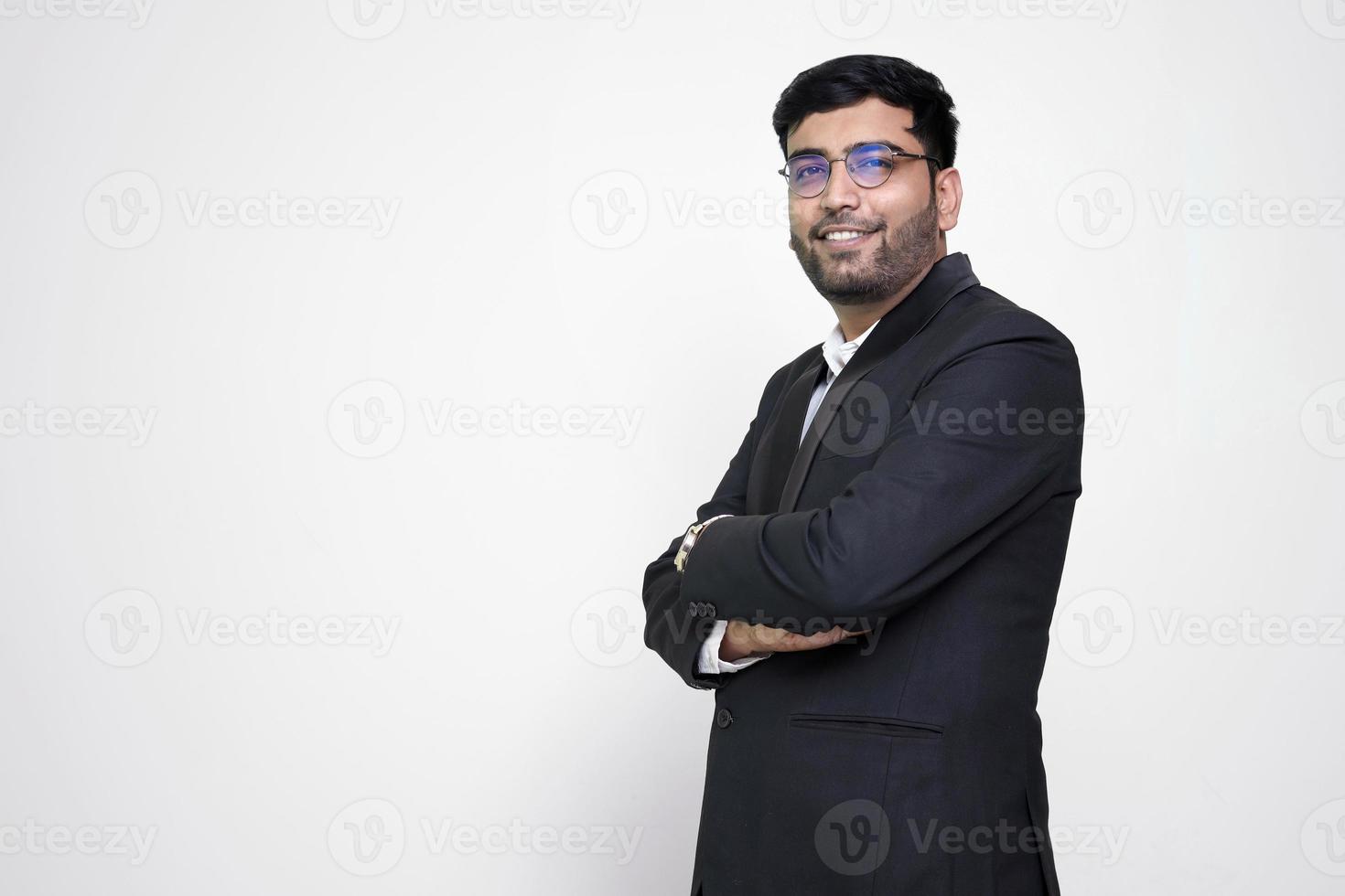 Portrait of confident businessman on the white isolated background. photo