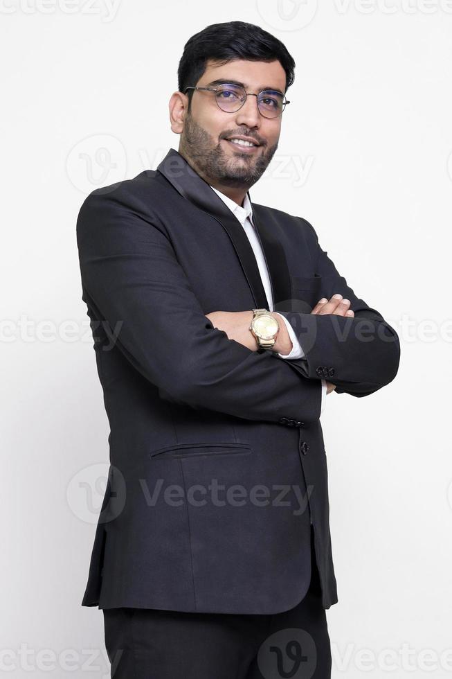 Portrait of confident businessman on the white isolated background. photo