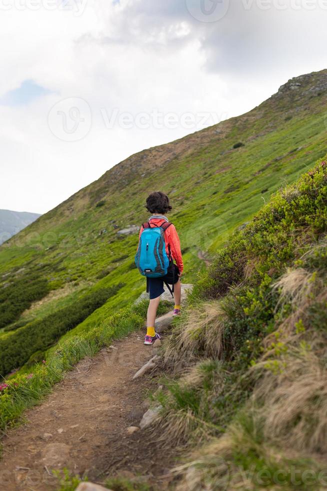 child with a backpack photo