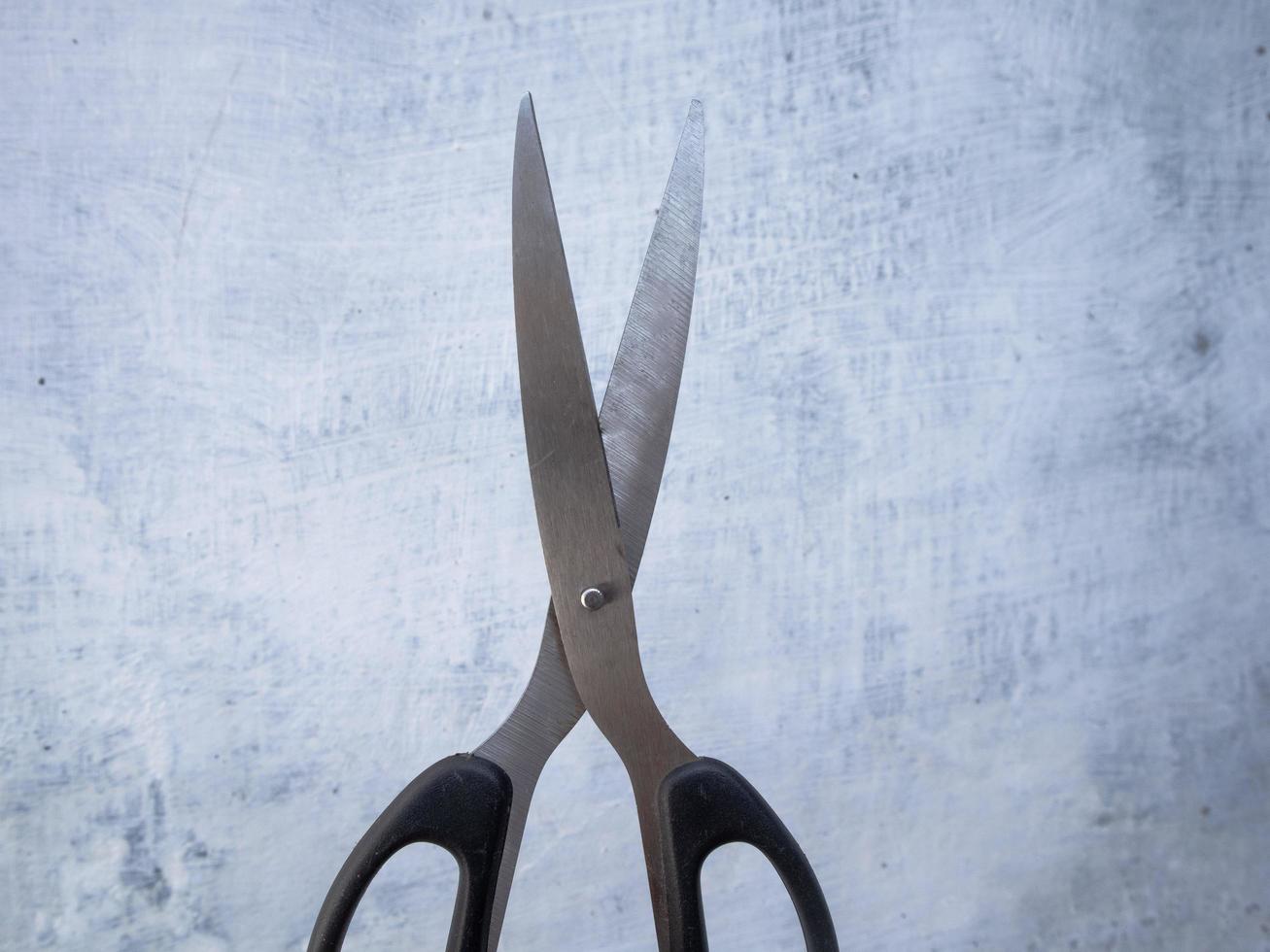 close-up photo of scissors in a standing position