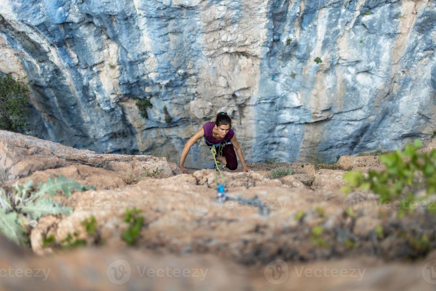 female rock climber photo