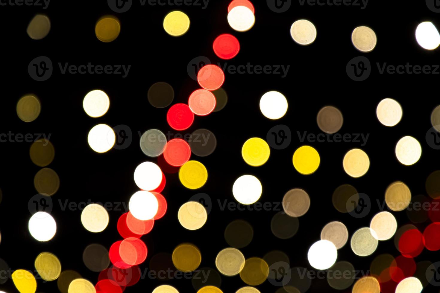 Abstract bokeh light effects on the night. Black background with colorful light effects. background with  Blur bokeh effects. Abstract background texture photo