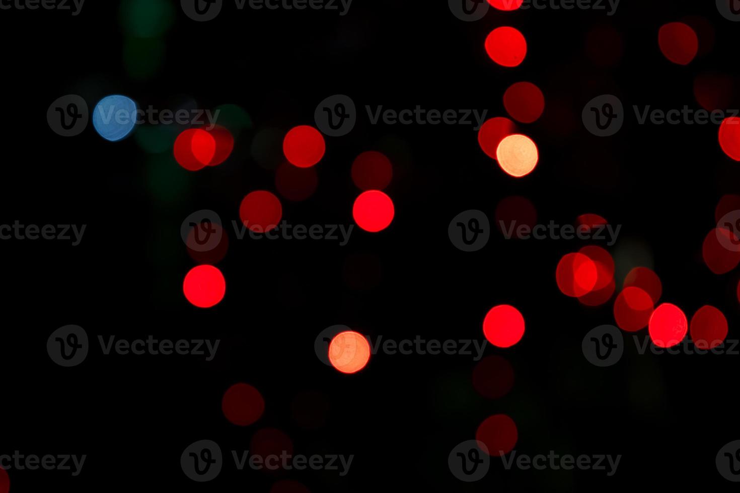 Abstract bokeh light effects on the night. Black background with colorful light effects. background with  Blur bokeh effects. Abstract background texture photo