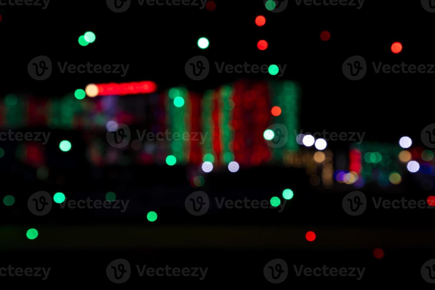 Abstract bokeh light effects on the night. Black background with colorful light effects. background with  Blur bokeh effects. Abstract background texture photo