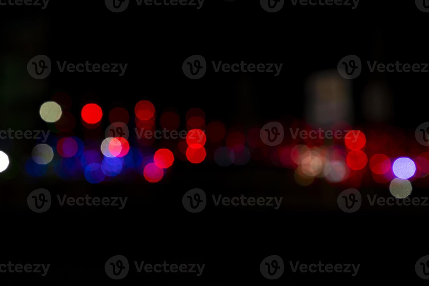 Abstract bokeh light effects on the night. Black background with colorful light effects. background with  Blur bokeh effects. Abstract background texture photo