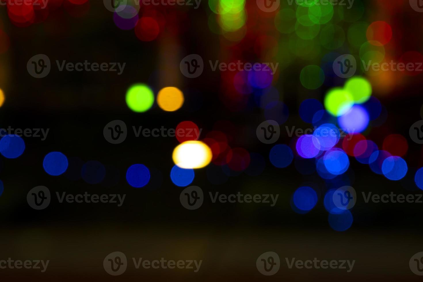 Abstract bokeh light effects on the night. Black background with colorful light effects. background with  Blur bokeh effects. Abstract background texture photo