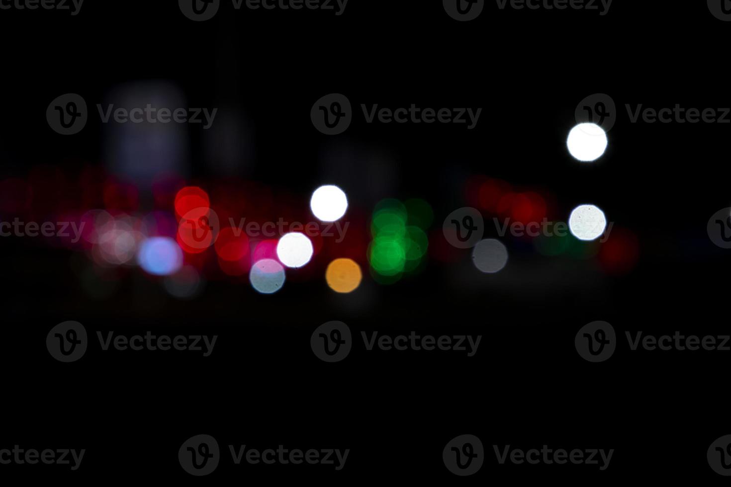Abstract bokeh light effects on the night. Black background with colorful light effects. background with  Blur bokeh effects. Abstract background texture photo