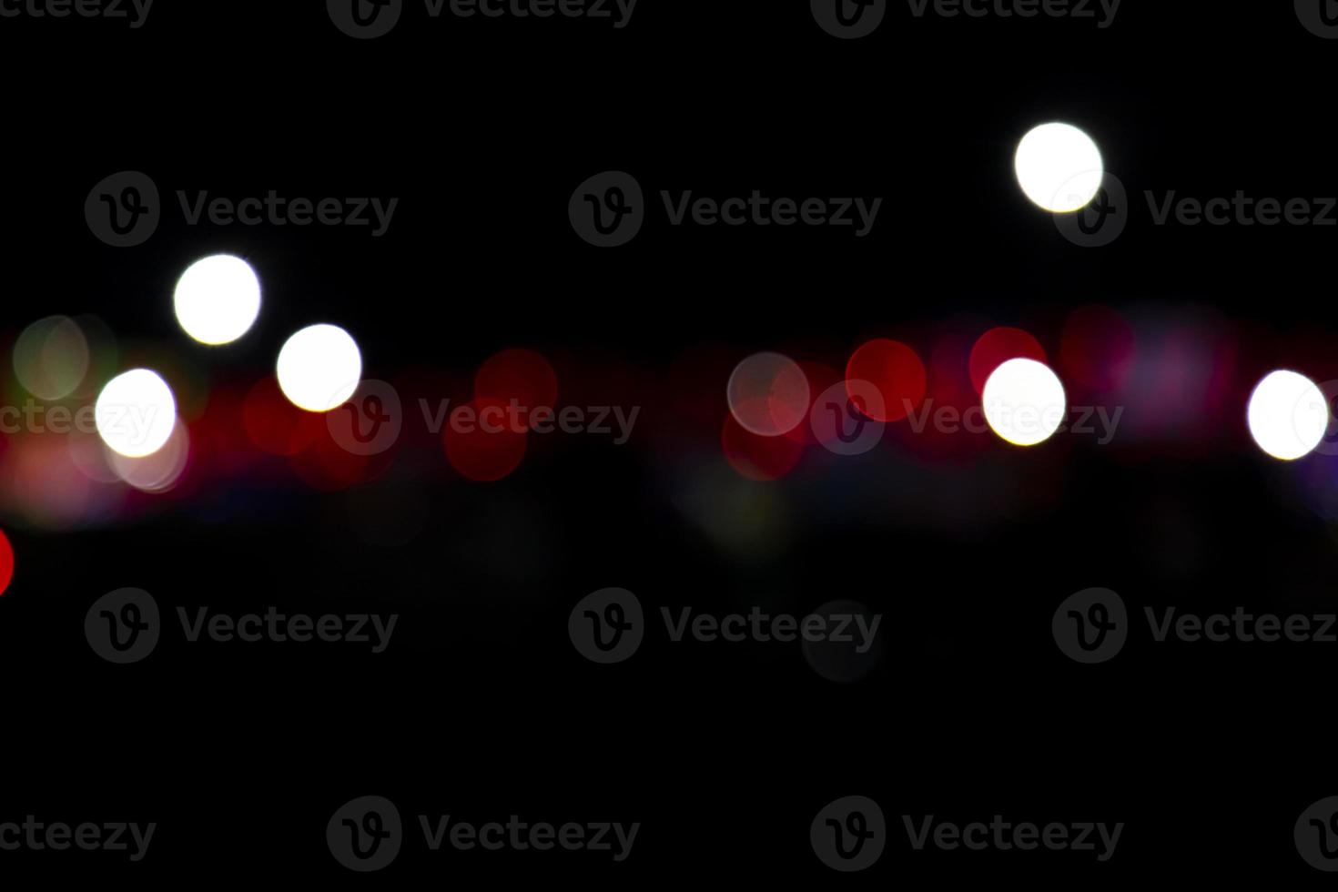 Abstract bokeh light effects on the night. Black background with colorful light effects. background with  Blur bokeh effects. Abstract background texture photo