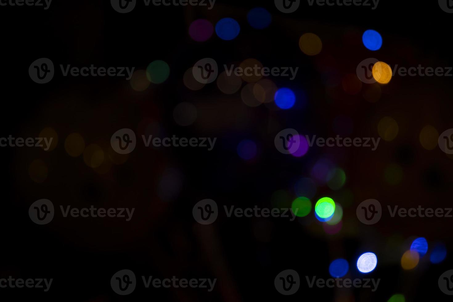 Abstract bokeh light effects on the night. Black background with colorful light effects. background with  Blur bokeh effects. Abstract background texture photo