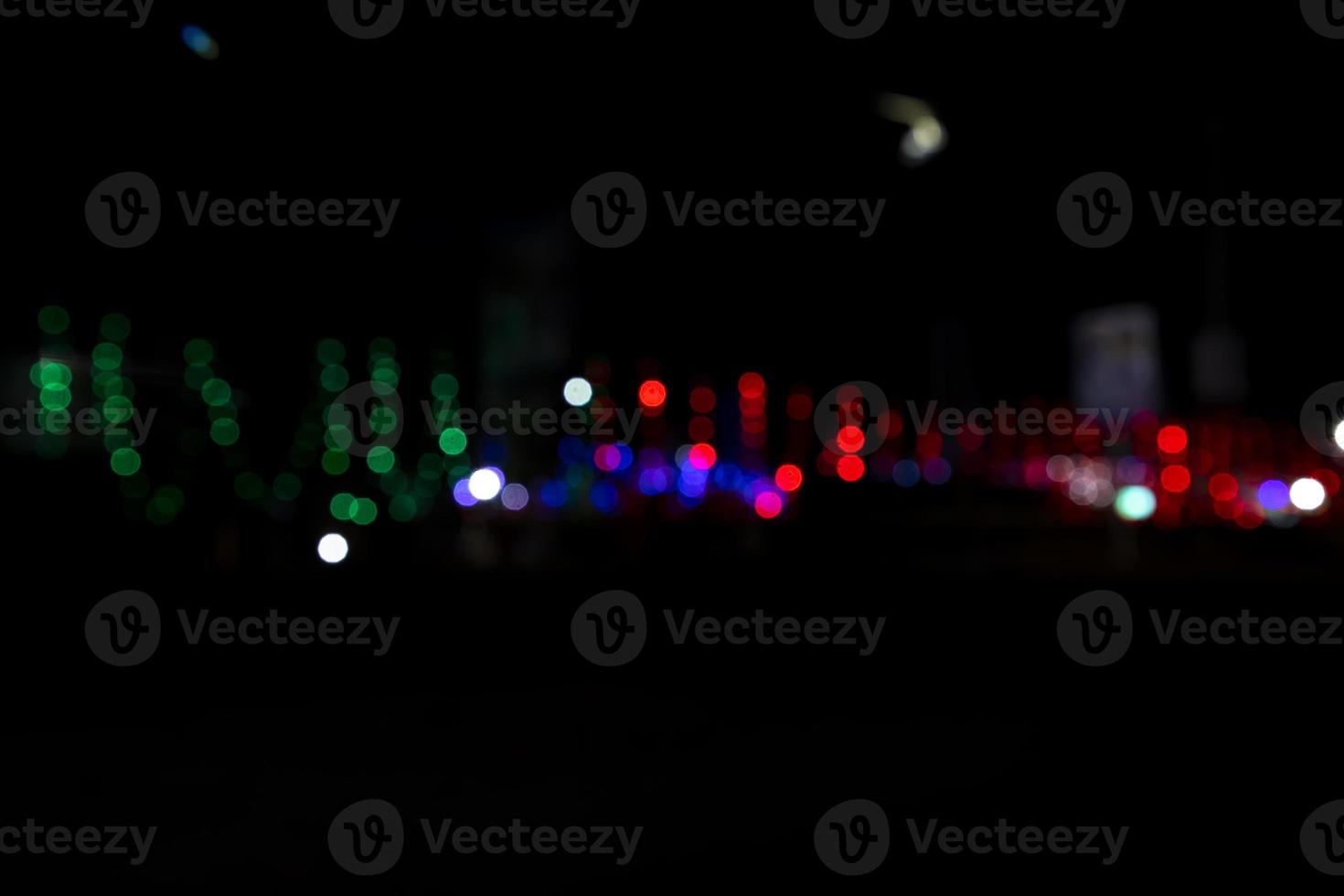 Abstract bokeh light effects on the night. Black background with colorful light effects. background with  Blur bokeh effects. Abstract background texture photo