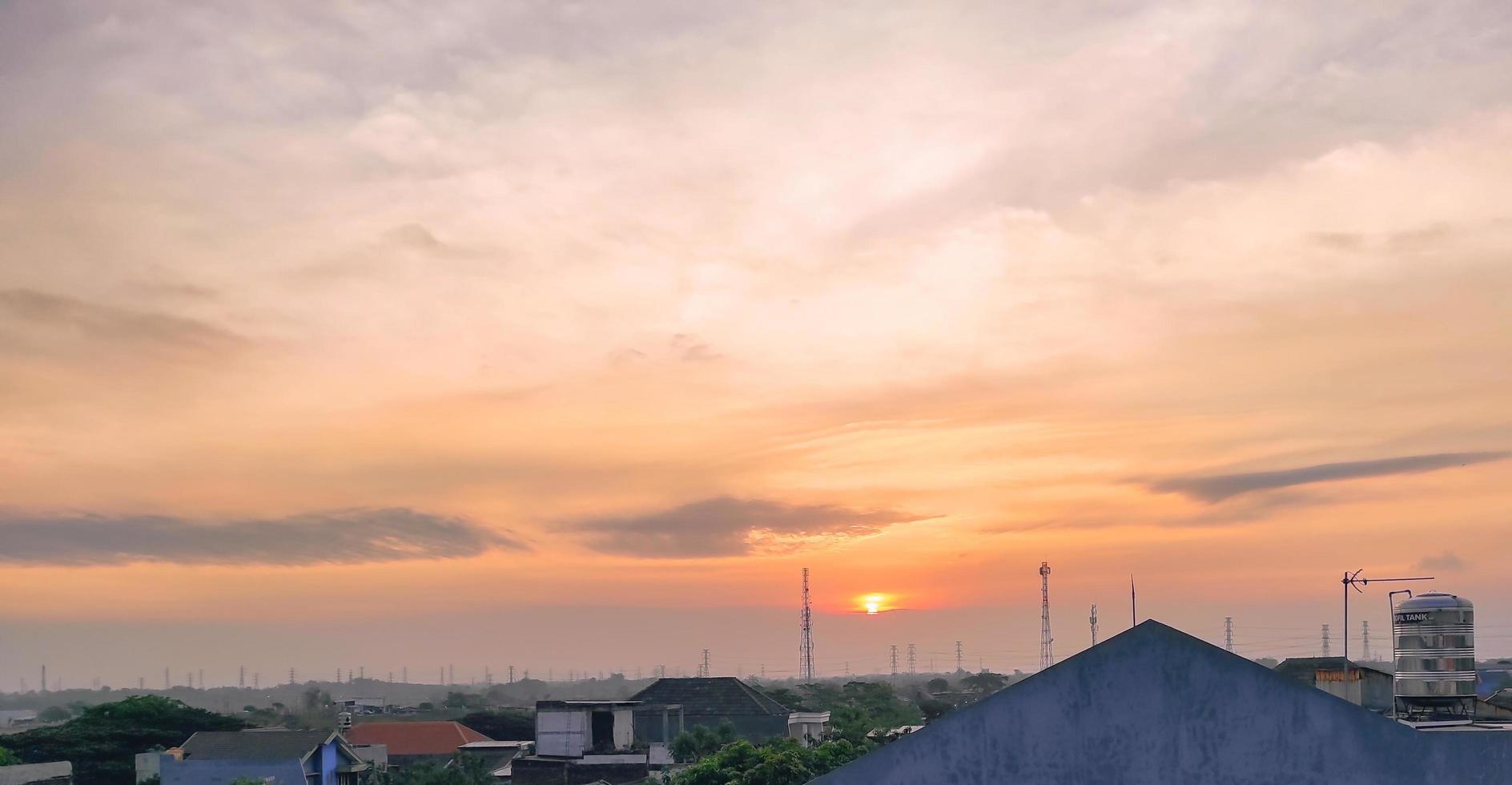 sunset view in residential area with silhouette background photo