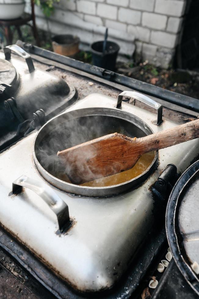 Cooking in the field kitchen during the war in Ukraine, conditions during the war. photo