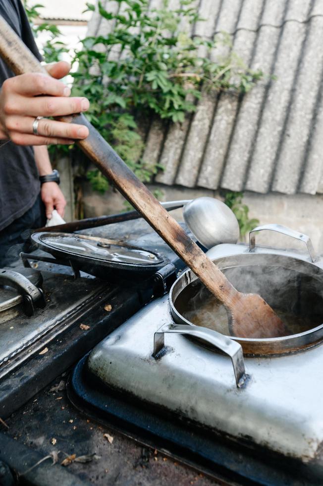 Cooking in the field during the war, field kitchen of the Ukrainian military. photo