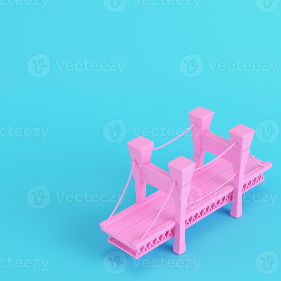 Pink cartoon styled bridge on bright blue background in pastel colors photo