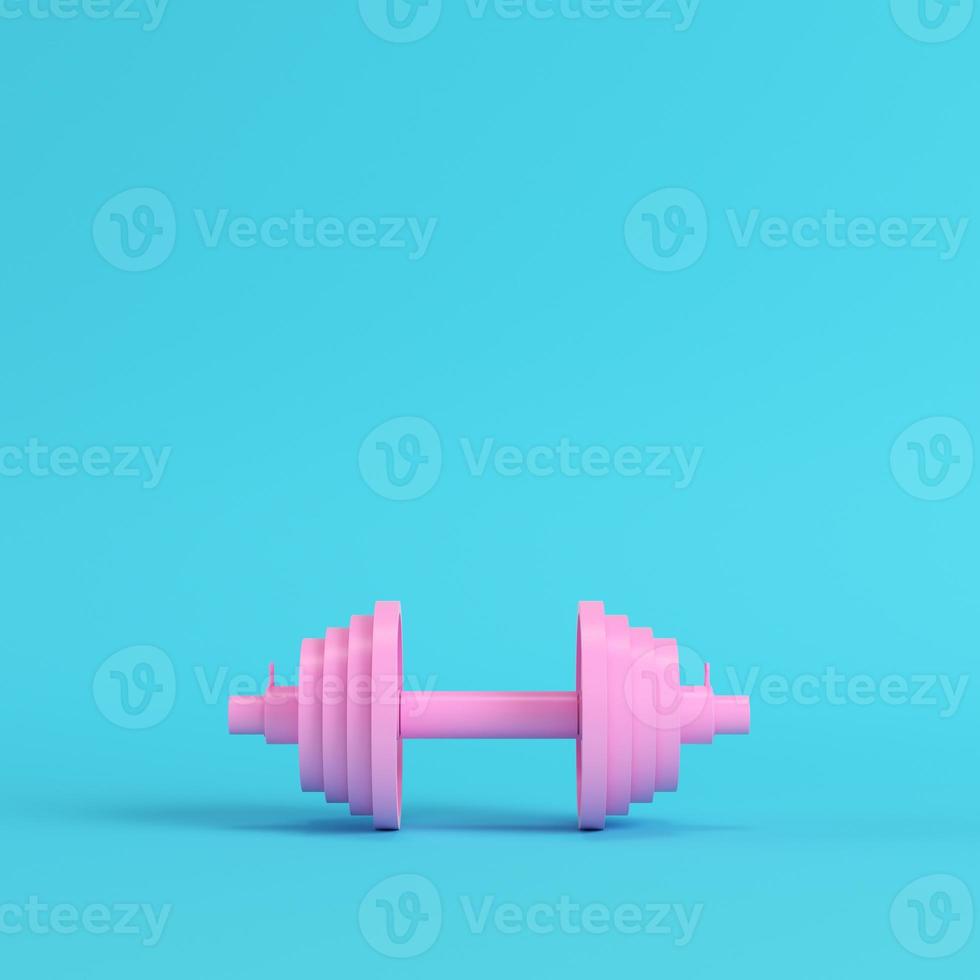 Abstract pink dumbbell on bright blue background in pastel colors photo