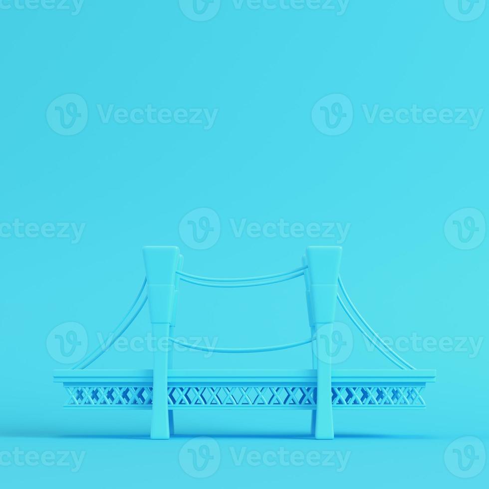 Cartoon styled bridge on bright blue background in pastel colors. Minimalism concept photo
