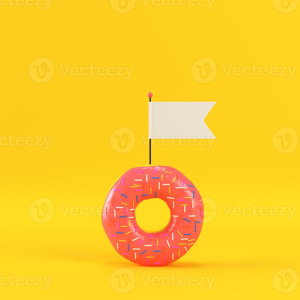 Donut with blank flag on yellow background photo