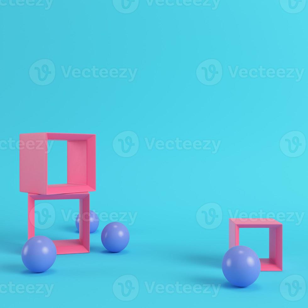 Empty display stands with spheres on bright blue background in pastel colors photo