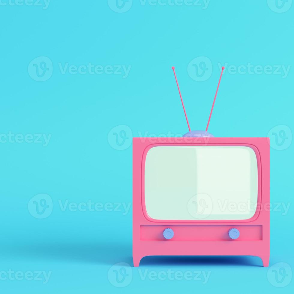 Pink cartoon styled tv on bright blue background in pastel colors photo