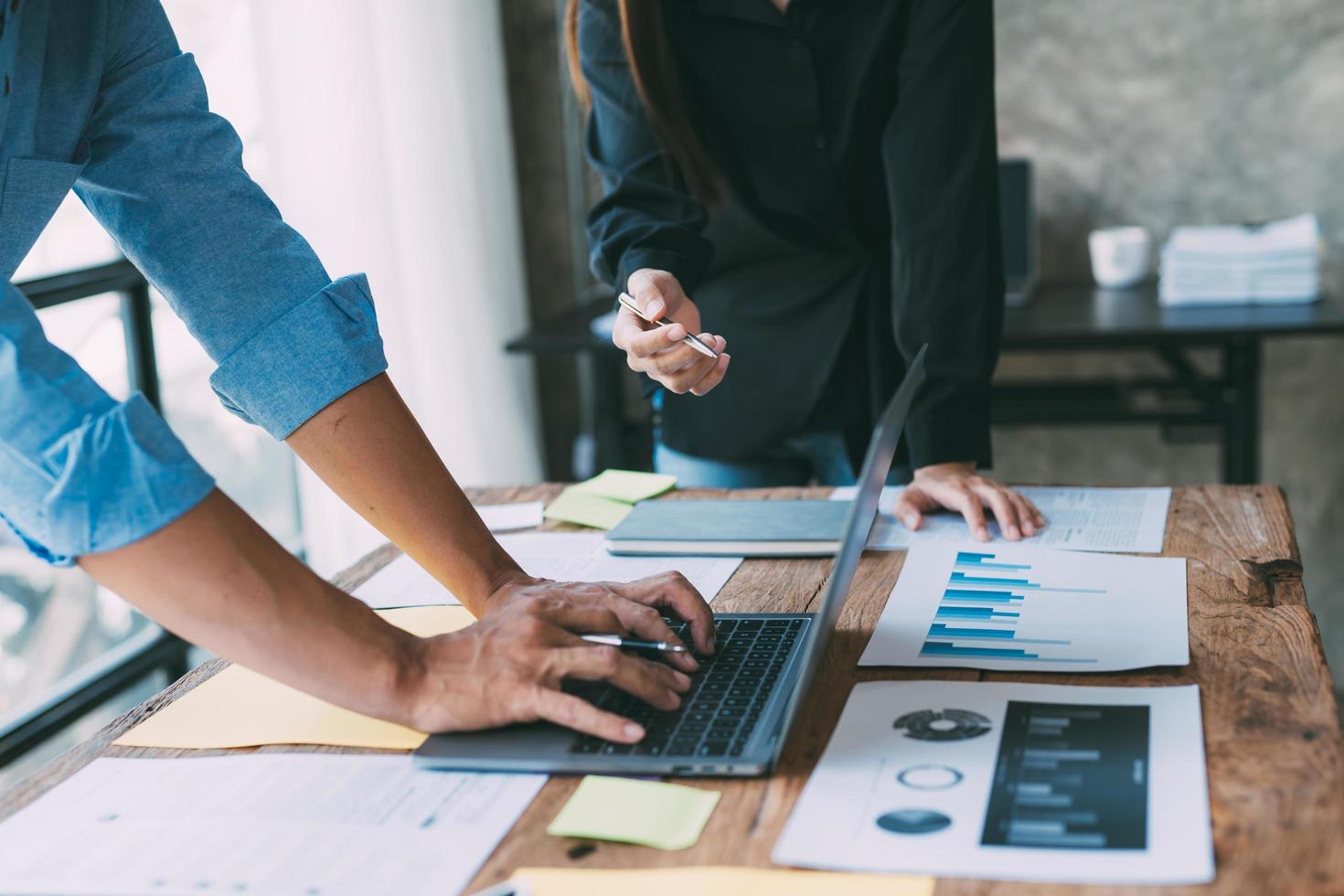 Business team meeting present.professional investor working with new startup project. Business sales consultant discussing in data documents at modern office. photo