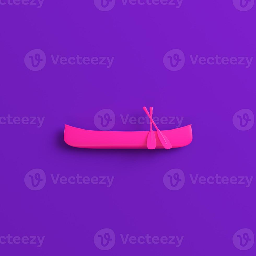 Pink canoe with paddles on purple background. Minimalism concept photo