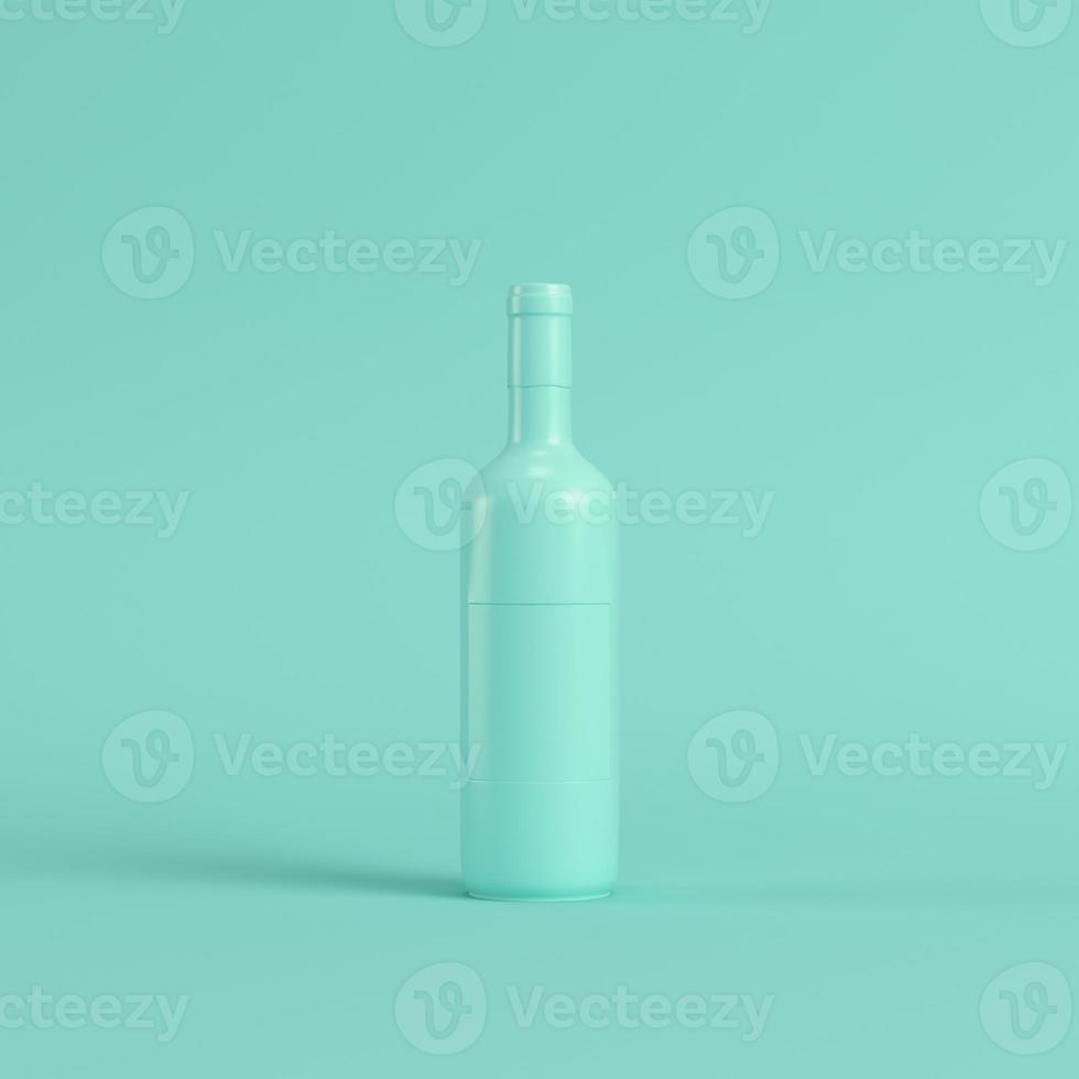 Wine bottle on bright green background in pastel colors. Minimalism concept photo