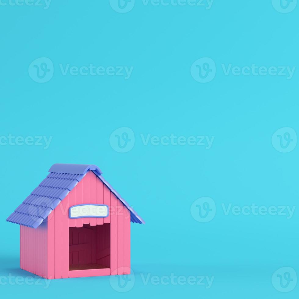 Pink doghouse on bright blue background in pastel colors photo