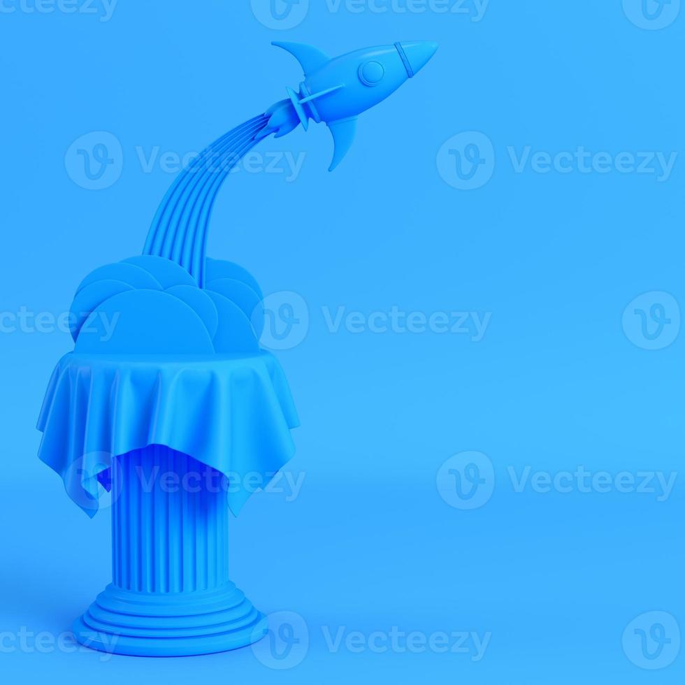 Launch rocket from a pillar on bright blue background photo