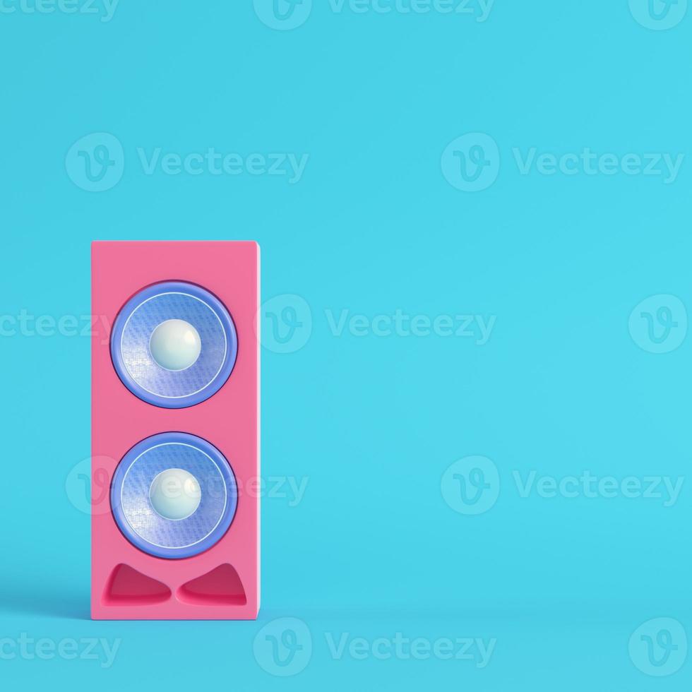 Pink speaker on bright blue background in pastel colors photo