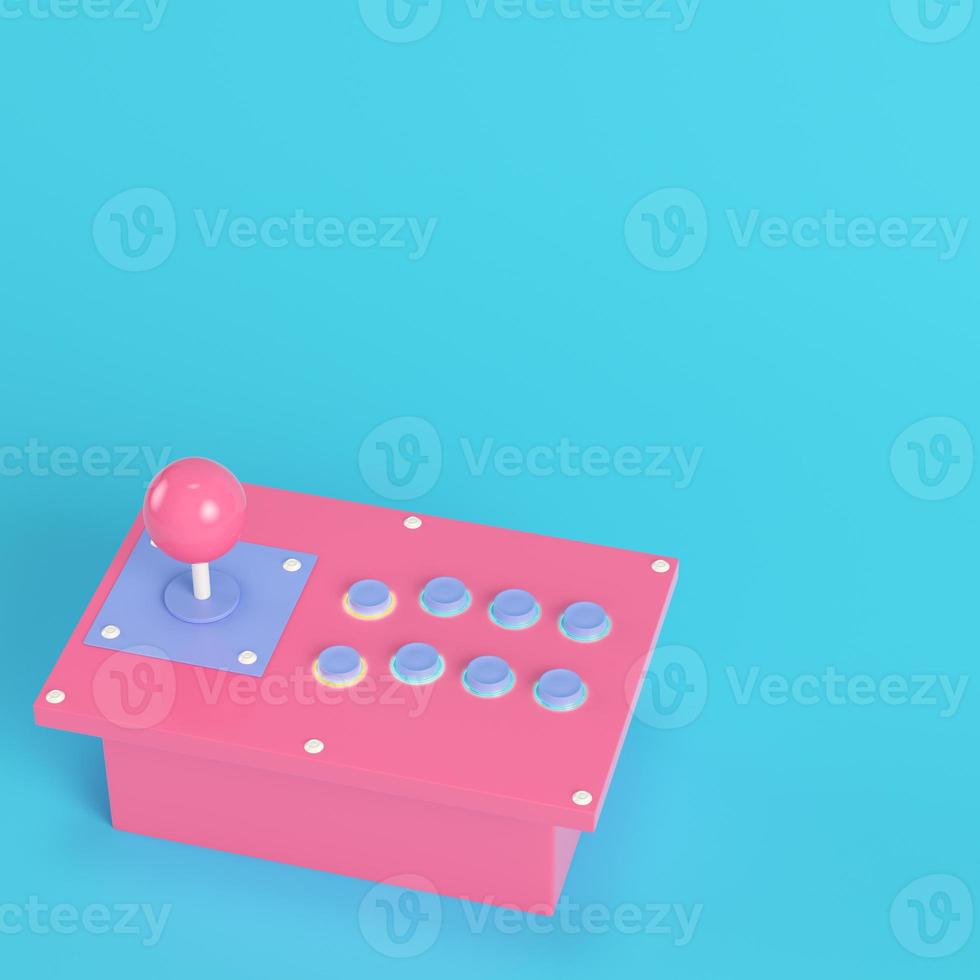 Retro arcade game controller on bright blue background in pastel colors photo
